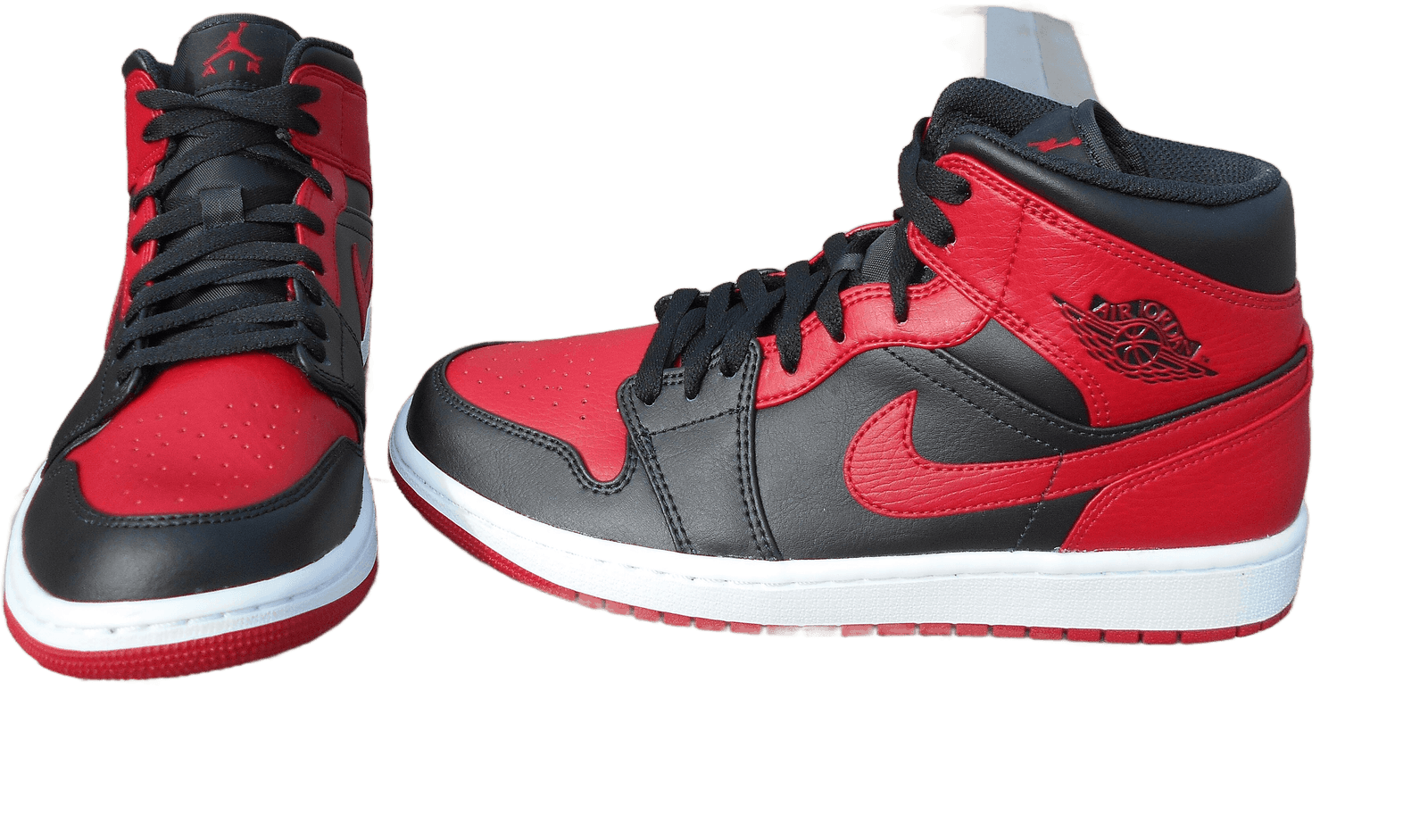 Air Jordan 1 Retro High OG in Banned (Black/Varsity Red)